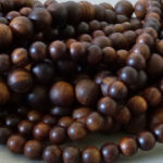 Padauk Holz Perle 6,2 mm - dunkelbraun
